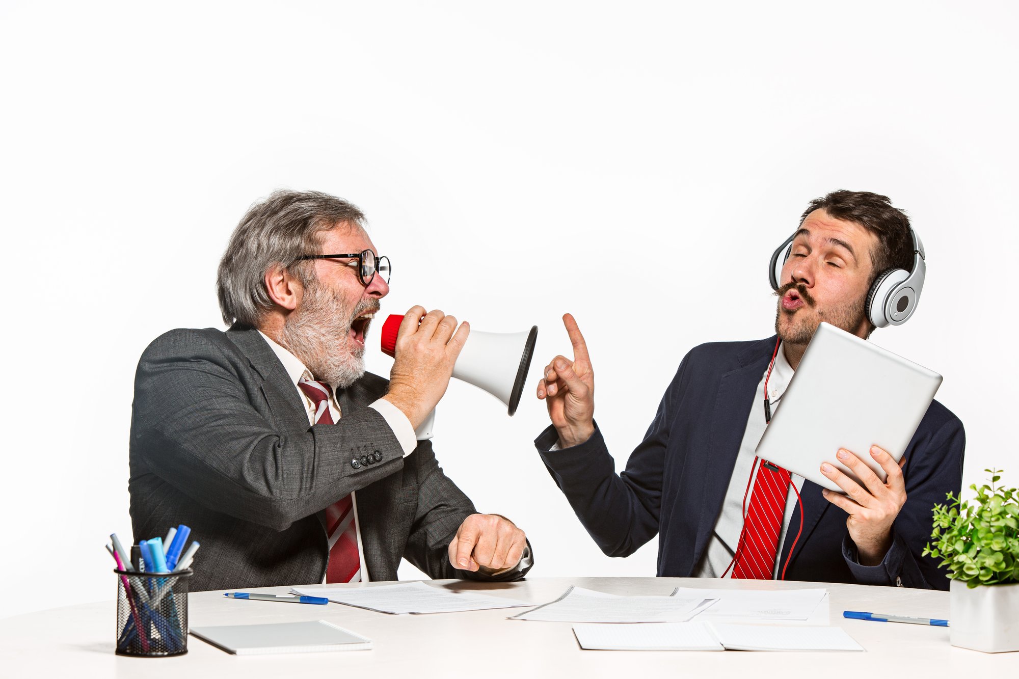 two-colleagues-working-together-office-white-studio
